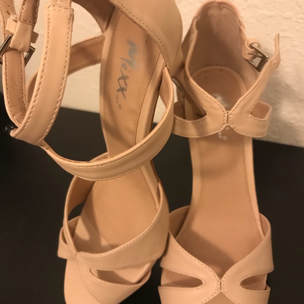 Beige pumps.